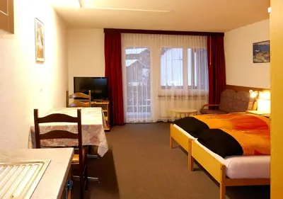 Ein Bett oder Betten in einem Zimmer der Unterkunft Apartments Albana