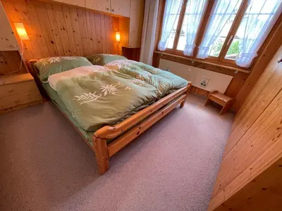 Ein Bett oder Betten in einem Zimmer der Unterkunft Apartment Résidence Sonnegg - Reimers - Vogel