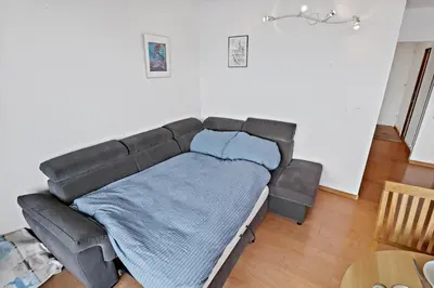 Ein Sitzbereich in der Unterkunft Appartement chaleureux avec une magnifique vue