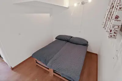 Ein Bett oder Betten in einem Zimmer der Unterkunft Appartement chaleureux avec une magnifique vue