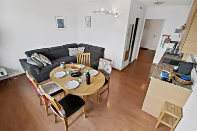 Ein Sitzbereich in der Unterkunft Appartement chaleureux avec une magnifique vue