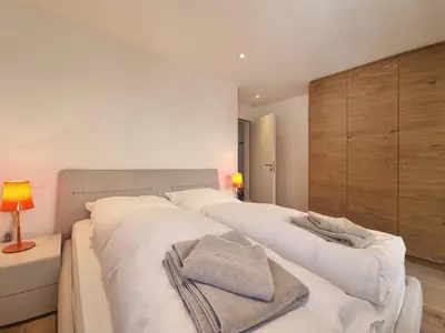 Ein Bett oder Betten in einem Zimmer der Unterkunft Duplex Apartment Bella Coppia