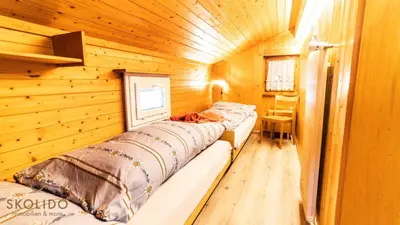 Ein Bett oder Betten in einem Zimmer der Unterkunft Haus Alpsegen, Riederalp Alpsegen Riederalp