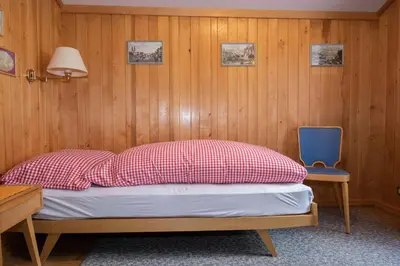 Ein Bett oder Betten in einem Zimmer der Unterkunft Chalet Grimm
