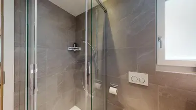 Ein Badezimmer in der Unterkunft Splendid modern studio in the heart of Zermatt