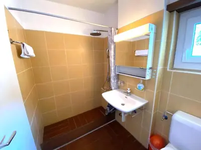 Ein Badezimmer in der Unterkunft Adler 66
