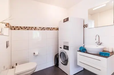 Ein Badezimmer in der Unterkunft Le Manoir 5