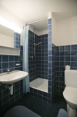 Ein Badezimmer in der Unterkunft Adler 76