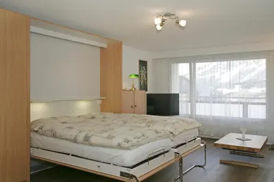 Ein Bett oder Betten in einem Zimmer der Unterkunft Adler 76