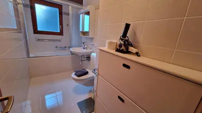 Ein Badezimmer in der Unterkunft Alpenhof