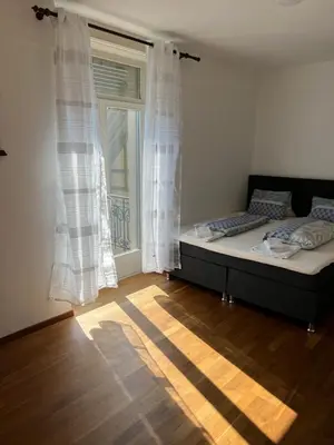 Ein Bett oder Betten in einem Zimmer der Unterkunft SAVOY 26