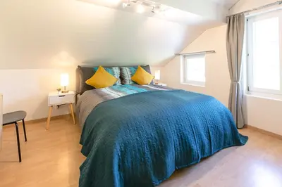 Ein Bett oder Betten in einem Zimmer der Unterkunft Spirit Apartments - Balkon mit Seesicht - Parkplatz