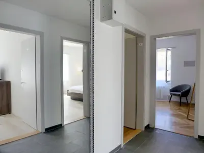 Ein Bett oder Betten in einem Zimmer der Unterkunft Apartment Henry's 100 by Interhome