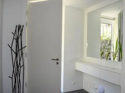 Ein Badezimmer in der Unterkunft Apartment Capriccio 14 Balcony by Interhome