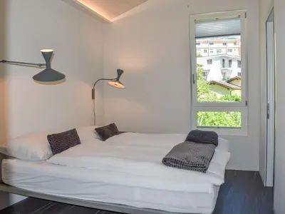 Ein Bett oder Betten in einem Zimmer der Unterkunft Apartment Capriccio 14 Balcony by Interhome