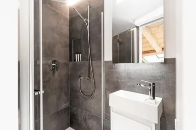 Ein Badezimmer in der Unterkunft Haus Beta by Zermatt Premium Apartments