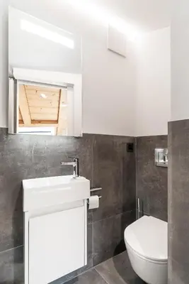 Ein Badezimmer in der Unterkunft Haus Beta by Zermatt Premium Apartments