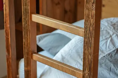 Ein Bett oder Betten in einem Zimmer der Unterkunft Chalet t'Alpa