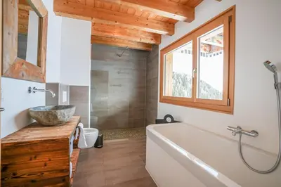 Ein Badezimmer in der Unterkunft Chalet t'Alpa