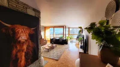 Ein Sitzbereich in der Unterkunft L'AvantGardiste, Spacious 6 bedrooms duplex, panoramic view