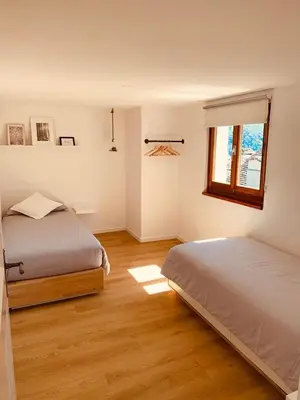 Ein Bett oder Betten in einem Zimmer der Unterkunft Casa Mille Sassi
