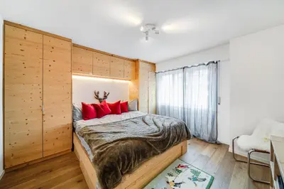 Ein Bett oder Betten in einem Zimmer der Unterkunft In the heart of Crans, fireplace and parking