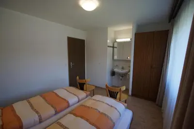Ein Bett oder Betten in einem Zimmer der Unterkunft Haus Amor