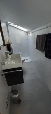 Ein Badezimmer in der Unterkunft Chalet Sunnmätteli