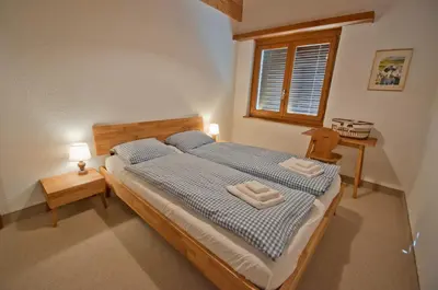 Ein Bett oder Betten in einem Zimmer der Unterkunft Residence Bellevue, Apartment Alpina