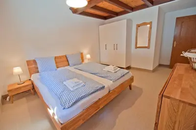 Ein Bett oder Betten in einem Zimmer der Unterkunft Residence Bellevue, Apartment Alpina
