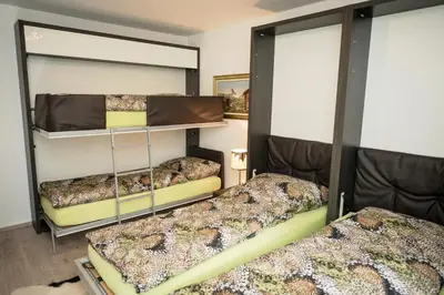 Ein Bett oder Betten in einem Zimmer der Unterkunft Charming Appartment in Zermatt - 
