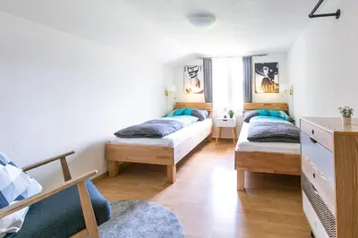 Ein Bett oder Betten in einem Zimmer der Unterkunft Spirit Apartments - XXL-Apt mit Balkon und Seesicht