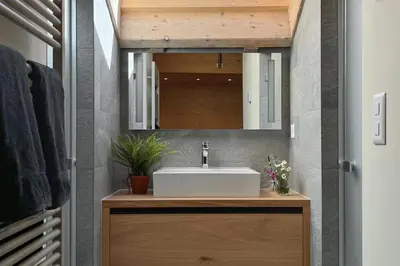 Ein Badezimmer in der Unterkunft Oasis-Zermatt