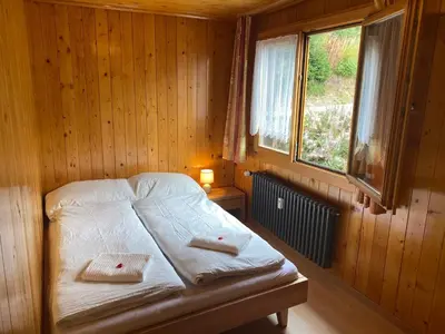 Ein Bett oder Betten in einem Zimmer der Unterkunft Chalet Diana - Spacious flat - Village core - South facing - Ski-in/Ski-out