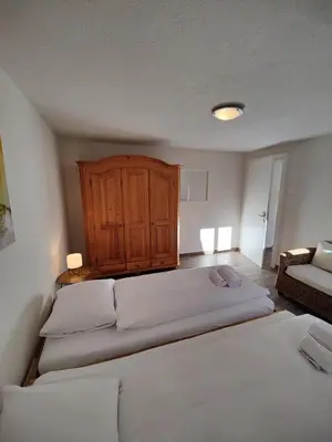 Ein Bett oder Betten in einem Zimmer der Unterkunft Hubel Apartment 14