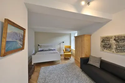 Ein Bett oder Betten in einem Zimmer der Unterkunft City Center Apartment