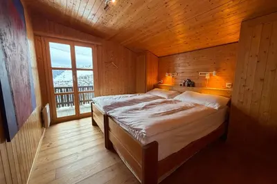 Ein Bett oder Betten in einem Zimmer der Unterkunft Chalet Mungg