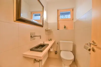 Ein Badezimmer in der Unterkunft Chalet Arnica