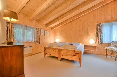 Ein Bett oder Betten in einem Zimmer der Unterkunft Chalet Arnica