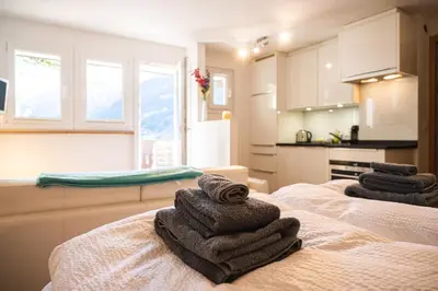 Ein Bett oder Betten in einem Zimmer der Unterkunft Studio direkt im Zentrum, tolle Terrasse, Aussicht