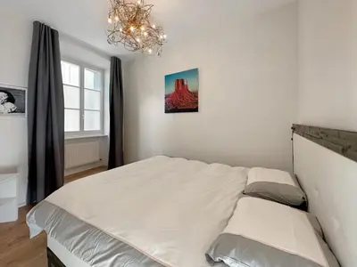 Ein Bett oder Betten in einem Zimmer der Unterkunft The Place to Be in Sion