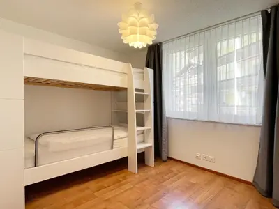 Ein Bett oder Betten in einem Zimmer der Unterkunft Big and chique Matterhorn view apartment 4 per.