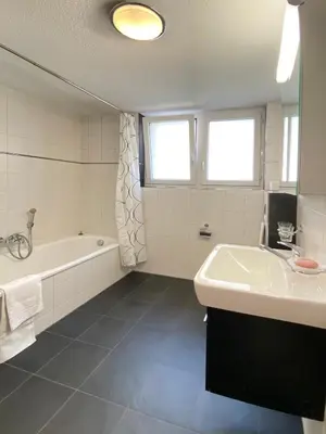 Ein Badezimmer in der Unterkunft Big and chique Matterhorn view apartment 4 per.
