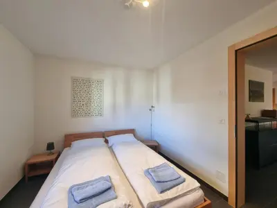 Ein Bett oder Betten in einem Zimmer der Unterkunft Pastis