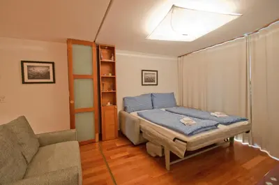Ein Bett oder Betten in einem Zimmer der Unterkunft Casa D'Amore, Apartment Lyskamm
