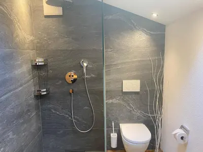 Ein Badezimmer in der Unterkunft Chalet Brünig
