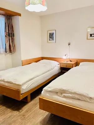 Ein Bett oder Betten in einem Zimmer der Unterkunft Im alten Dorfteil von Zermatt