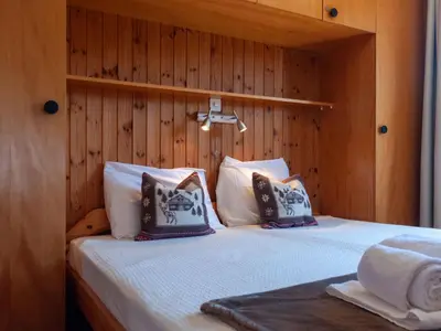 Ein Bett oder Betten in einem Zimmer der Unterkunft Apartment Les Crêtes 1-4 by Interhome