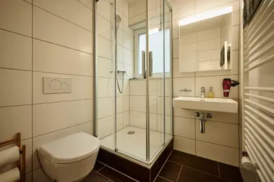 Ein Badezimmer in der Unterkunft Lakeside Tiny House Brienz