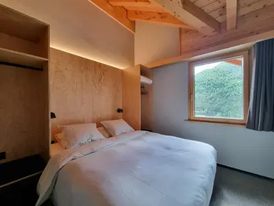 Ein Bett oder Betten in einem Zimmer der Unterkunft Sole Penthouse